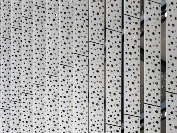 Various designs of perforated metal veneer