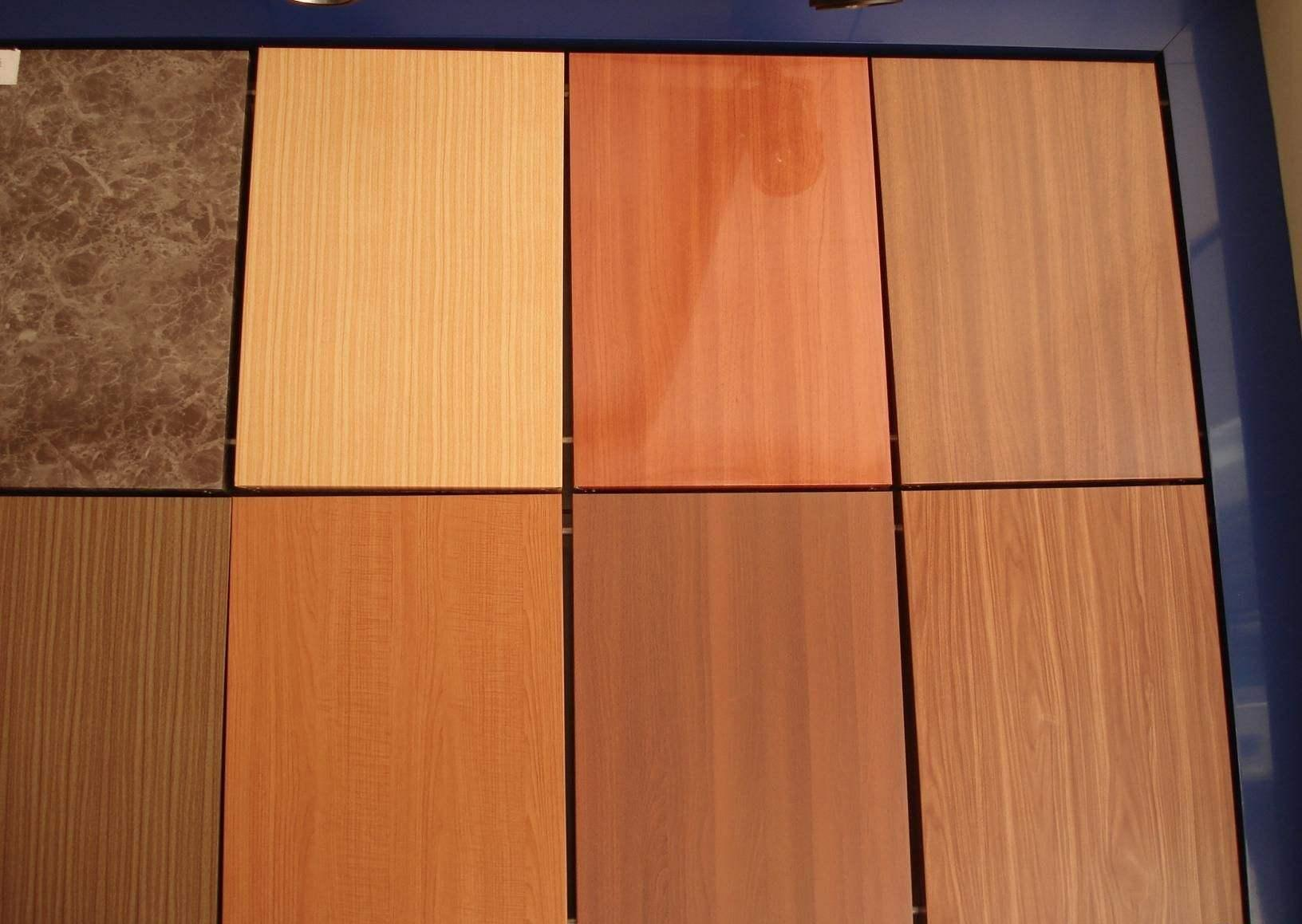 How is the wood-grain aluminum veneer made?