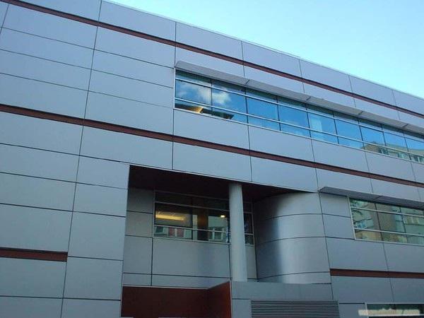 What is the proper way to maintain and clean aluminum composite panels?